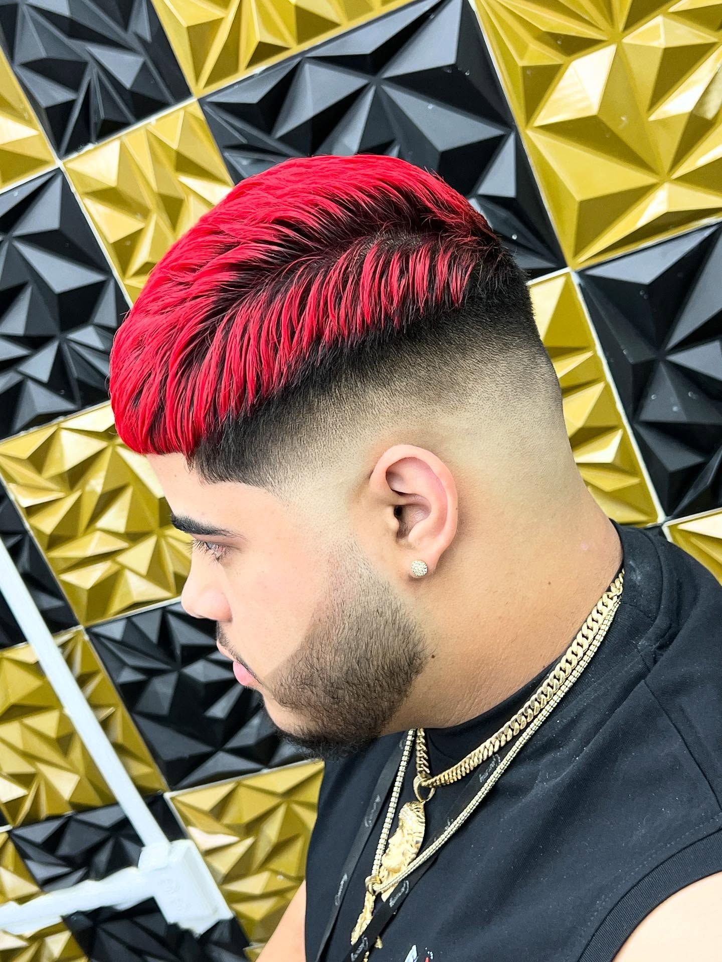 Red color fade haircut by Ilverth Barber NYC